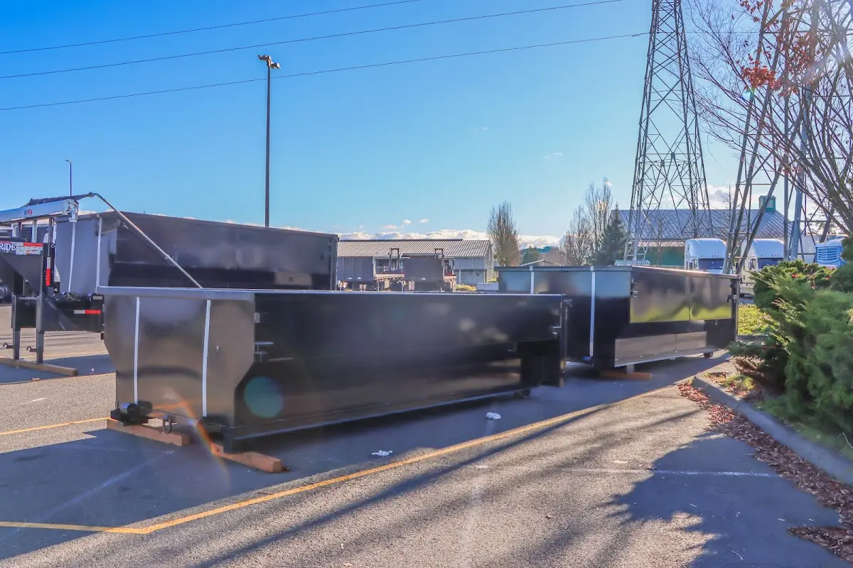 Roll-off dumpster ready for waste disposal at job site for Concrete Dumpster Rental in Lima